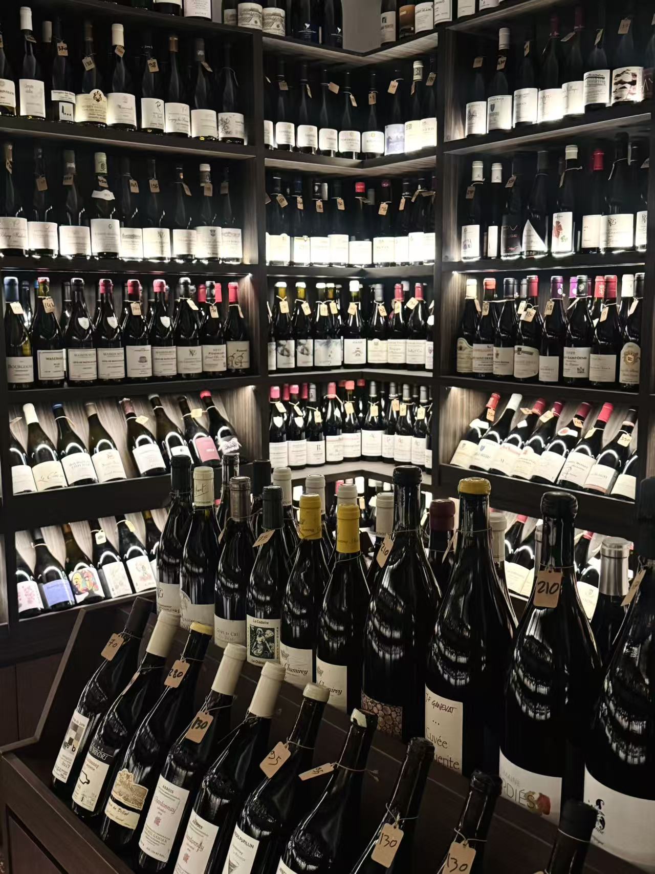 The illuminated bottle room at Patrimonio Wines