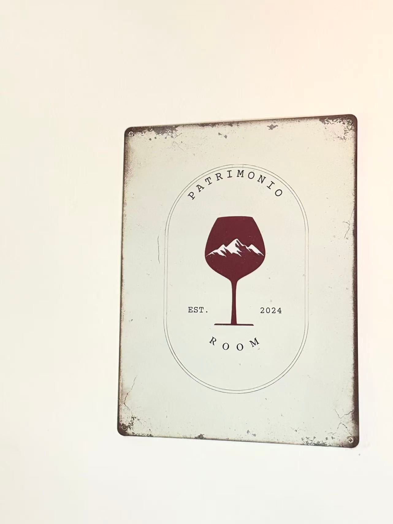The Patrimonio Room label